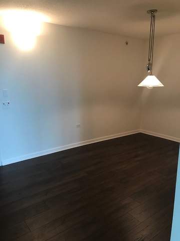9655 Woods Drive #1206 Skokie, Illinois 60077 - Large dining area off kitchen with new hardwood flooring that could also be an office/den