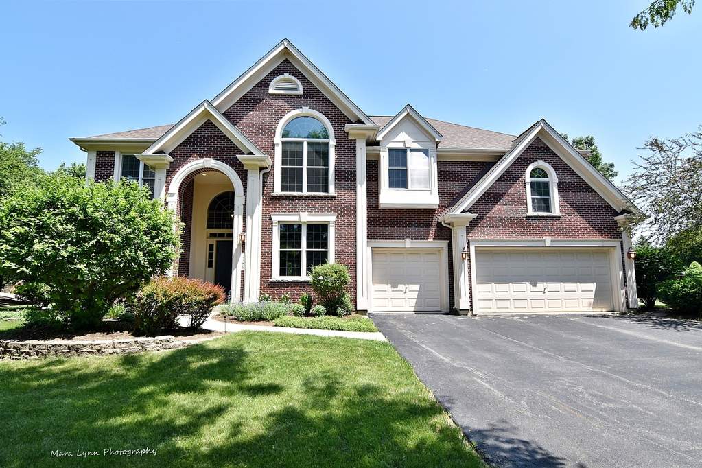 1189 Keim Court Geneva, Illinois 60134 - BEAUTIFUL BRICK AND CEDAR CUSTOM HOME LOCATED ON A QUIET CUL-DE-SAC~